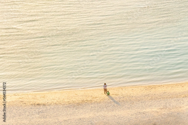 Obraz 夕日と親子