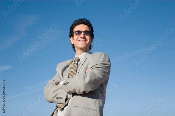 Fototapeta Young businessman smiling