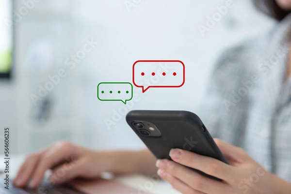 Fototapeta Businesswoman using smartphone with chatbox message, chatting communication connect on mobile phone. Contact via wireless technology. social media concept.