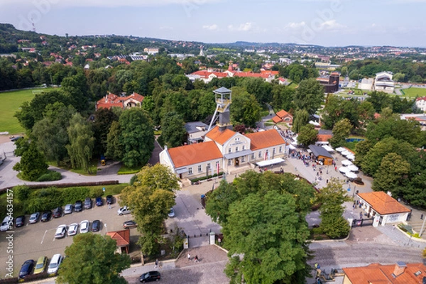 Fototapeta Wieliczka, Lesser Poland. Salt mine, graduation tower, railway station and other popular buildings and architecture on a sunny day in Wieliczka.