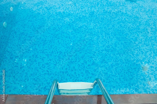 Fototapeta ladder into the pool of blue color without water