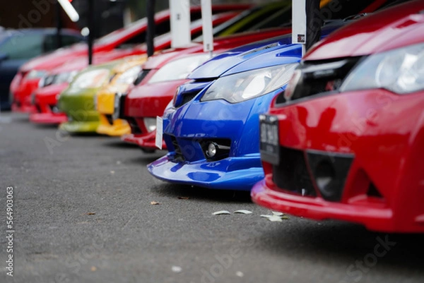 Obraz Side view of a Japanese sports car, showing the car's bumper.