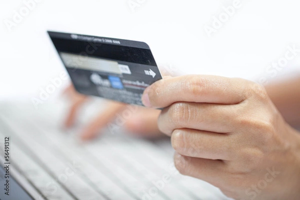 Obraz Using a credit card.