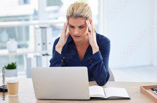 Fototapeta Workplace stress, business woman with headache at desk and reading email on laptop in London office. Receptionist working, young person with burnout or frustrated secretary with crisis at company