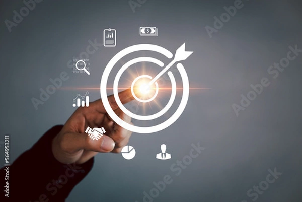 Fototapeta target on business, Businessman calculates financial data for long-term investment. planning and strategy, Stock market, Business growth, Businessman or investor Looking for a good fundamental fund.
