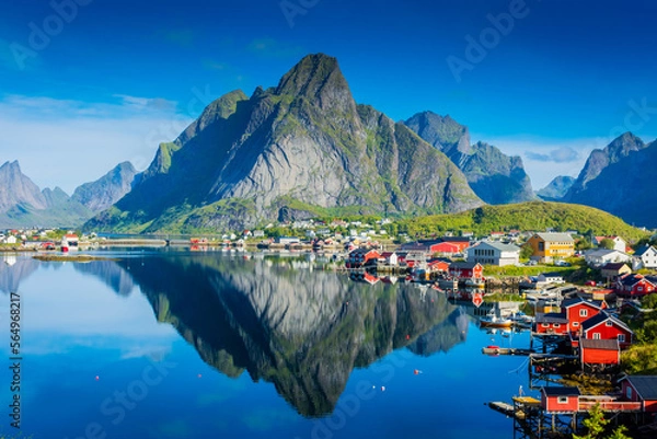 Fototapeta Perfect reflection of the Reine village on the water of the fjord in the Lofoten Islands,  Norway
