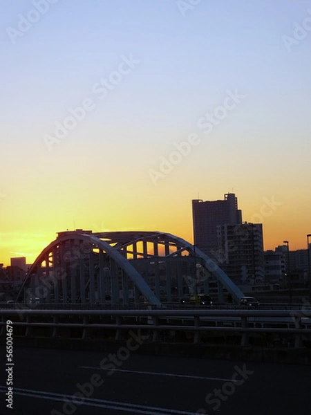 Obraz 夕焼けと橋　夕日　オレンジ