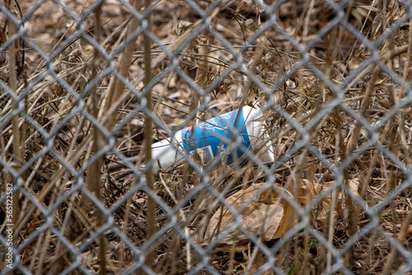 Fototapeta Garbage left on the ground