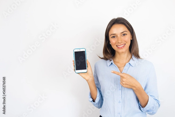 Fototapeta Business Woman Holding a Smartphone Pointing at It Showing Displaying Drawing Attention Technology
