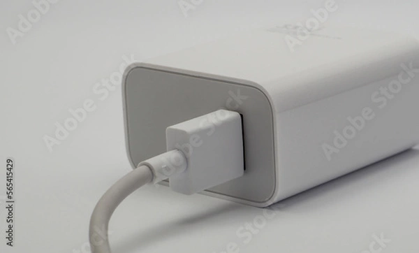 Fototapeta white mobile phone fast charger with usb cable 	
