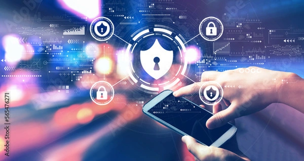 Fototapeta Cyber security theme with person using a smartphone at night