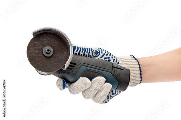 Fototapeta Worker's hand in gloves holding angle grinder machine. Isolated on white.