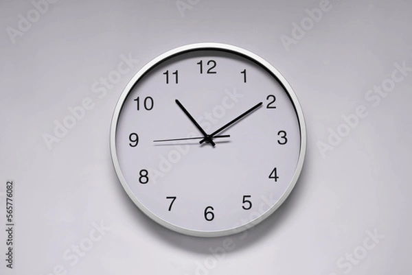 Fototapeta Stylish round clock on white background, top view. Interior element