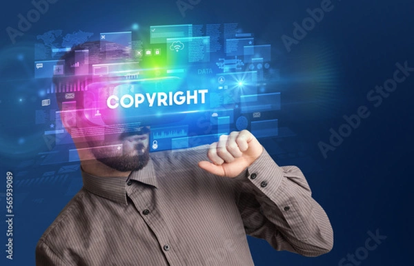 Fototapeta Businessman looking through Virtual Reality glasses