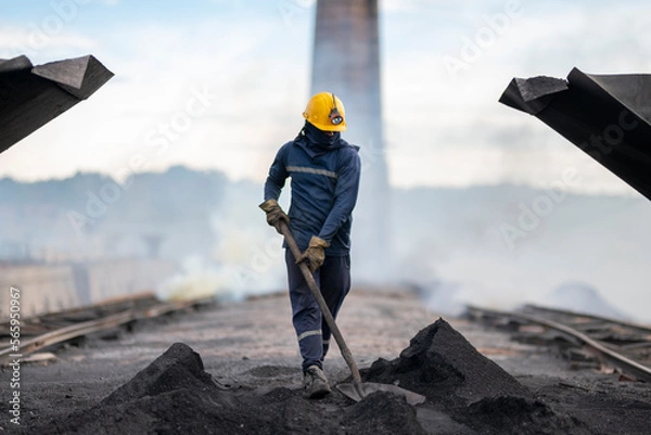 Fototapeta Workers at a coal-processing plant