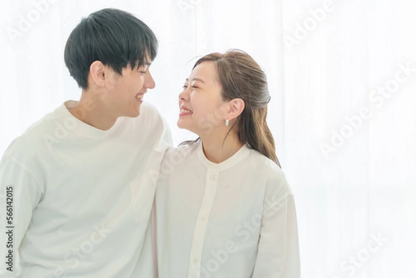 Obraz 見つめ合って笑うカップル