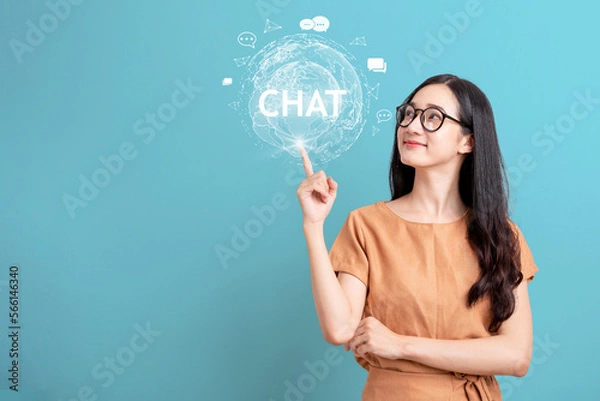 Fototapeta System Artificial intelligence chatgpt , Business woman using Laptop or Smartphone with Chat Bot AI , Technology smart robot Ai Chat application software , robot application Chat GPT