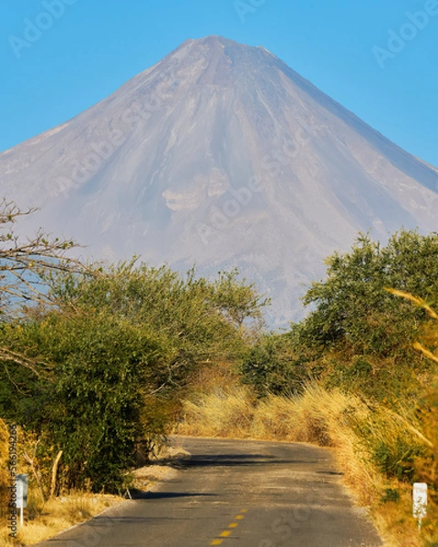 Fototapeta Colima volcano on a clear day with blue skies