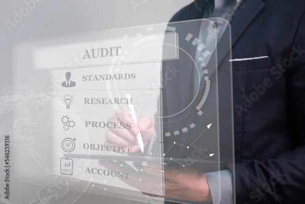 Fototapeta Audit for ISO standard, quality assurance for certification, an international process for improve industry. business man using tablet for audition.