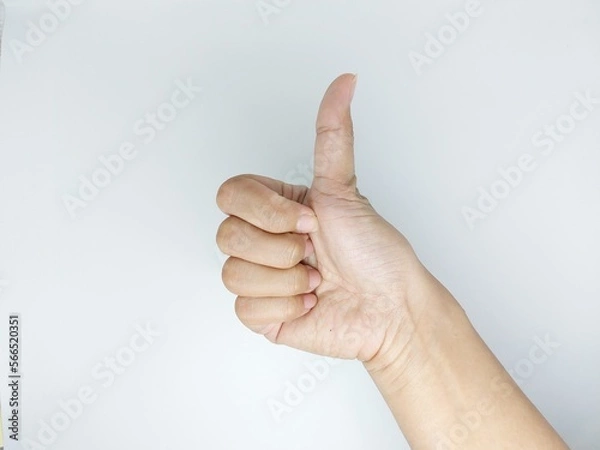 Fototapeta Close up hand male showing thumb up, ok, all right, victory hand sign gesture. Gestures and signs. Body language on white background