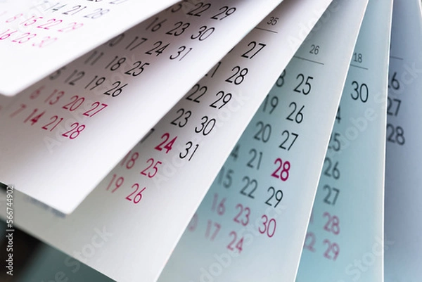 Fototapeta Calendar. Pages of a paper calendar. Close-up of calendar pages with date. 