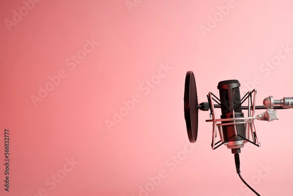 Fototapeta microphone on pink background with copy space for recording ,singing, podcasting concept.