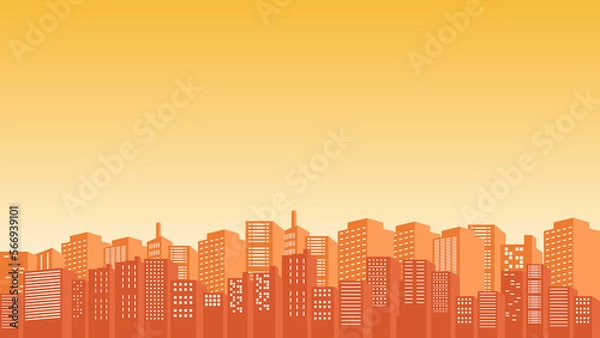 Fototapeta Shades of orange sky from the silhouette of the city with tall buildings around it