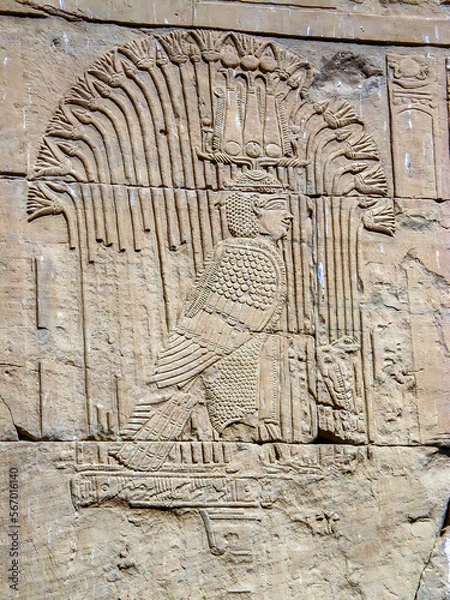 Obraz Human head bird body representing an ancient Egyptian mythological god carved on the wall of the Kom Ombo temple near Aswan.