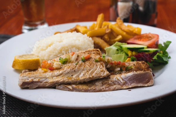 Fototapeta tuna steak with chips and rice