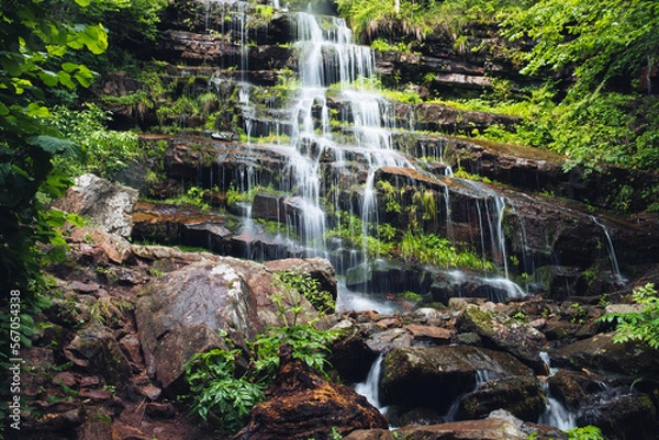 Obraz The fascinating Tupavica Waterfall is settled in a Dojkinci village at 1050 m above the sea level in the heart of Stara planina mountains, Serbia
