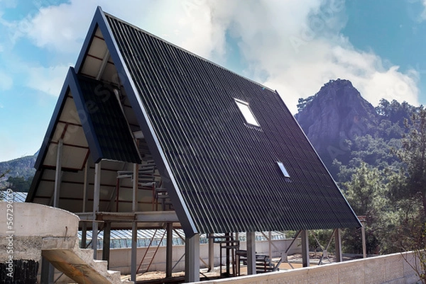 Fototapeta A frame triangle holiday house.construction of frame houses. construction frame triangle house.