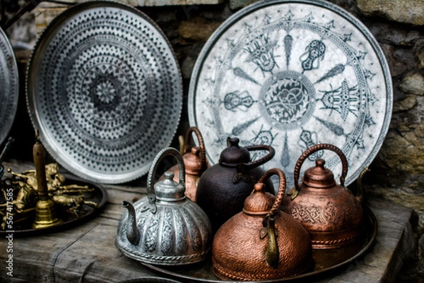 Obraz Traditionals steel and copper teapots and trays on the market. Concept of vintage decorative utensils. Souvenirs 