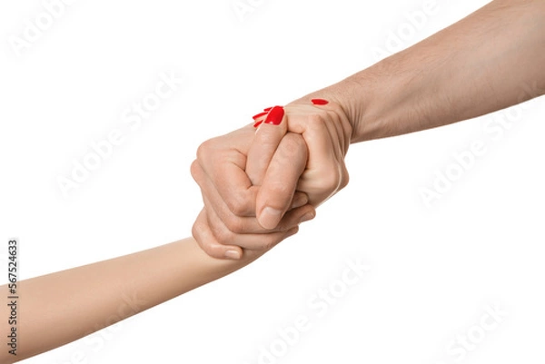 Fototapeta The man's hand clings tightly to the woman's, as if pulling it towards him.