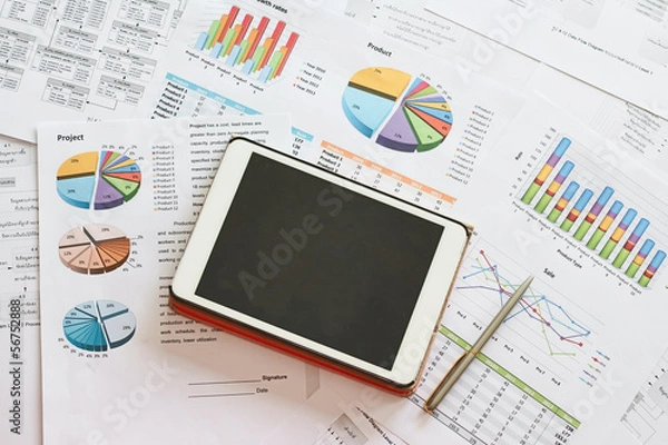 Fototapeta black screen tablet with analysis project financial chart  docum
