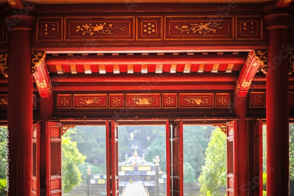 Obraz classical vietnamesered wooden interior of a entrance portal chainise style