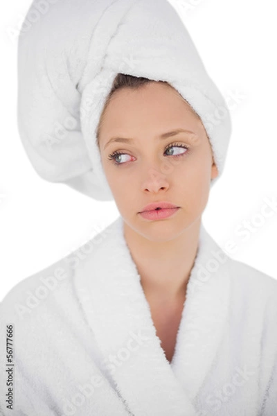 Obraz Thinking brunette in bathrobe looking away