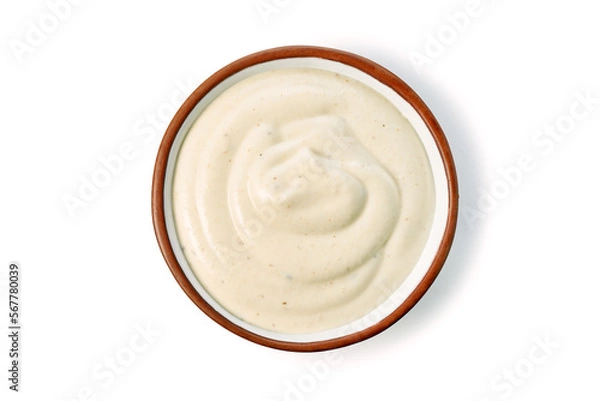 Fototapeta Bowl with tartar sauce or mayonnaise on white background