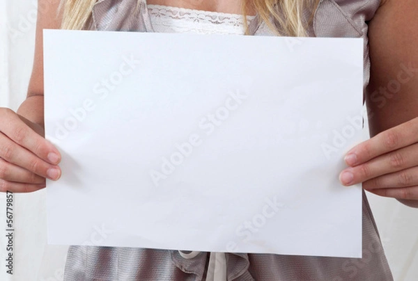 Obraz Two hands holding a white message canvas/paper