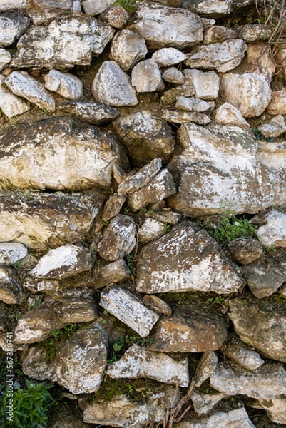 Fototapeta old stone wall with moss background