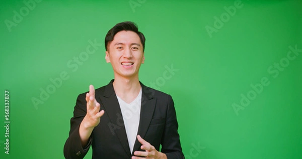 Obraz man in front green screen