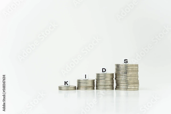 Fototapeta Close-up shot of a stack of coins with white background, concept of saving money and investing, copy space, background