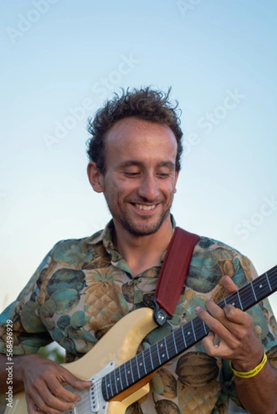 Obraz man playing guitar