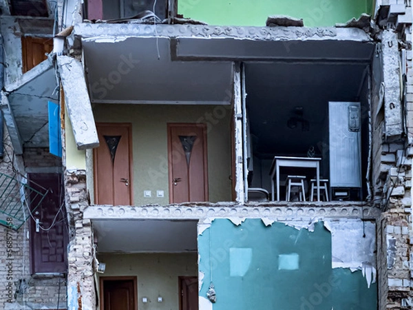 Fototapeta Borodyanka,Kyiv Region 02.05.2023 A surviving apartment in a bombed-out building