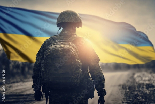Obraz Vertical shot of brave Ukrainian soldier at war, Ukrainian soldier with flag, remember the war Generative AI