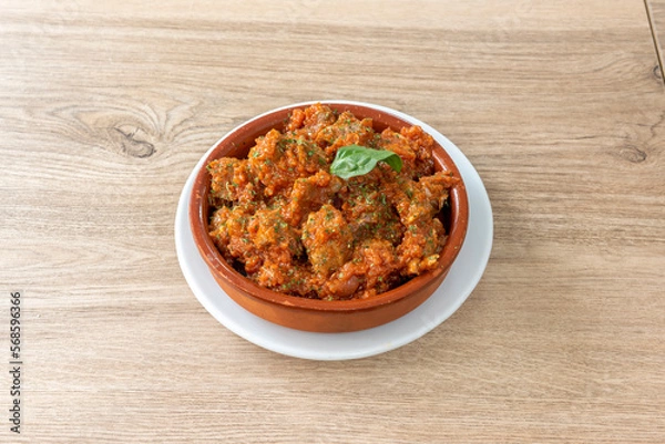 Fototapeta In Navarra, lean meat with tomato is usually made with ham and egg with tomato sauce