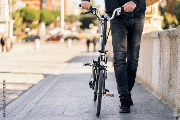 Obraz Unrecognized Person with Detachable Bike