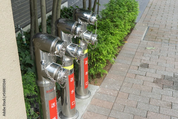 Fototapeta 都会のビルを火事から守る消火設備