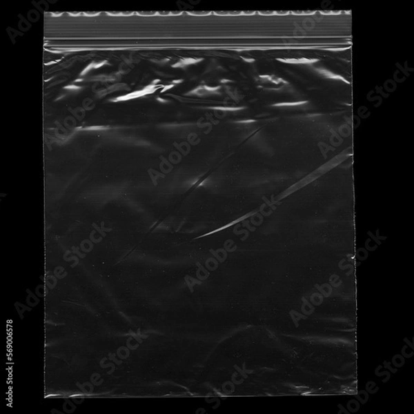 Fototapeta Wrinkled plastic wrap with zipper texture on a black background wallpaper. Royalty high-quality free stock photo image of realistic plastic wrap for overlay. Wrinkled plastic surface