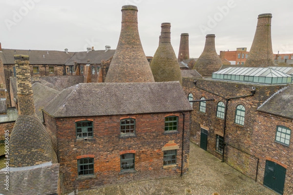 Fototapeta Stoke-on-trent, Staffordshire, England, March 3 2023. Old Gladstone Potteries with bottle ovens in the centre of Stoke on Trent, Staffordshire,UK. Industrial architecture in England