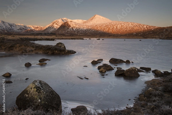 Fototapeta Dawn over a frozen lagune in Rannoch Moor